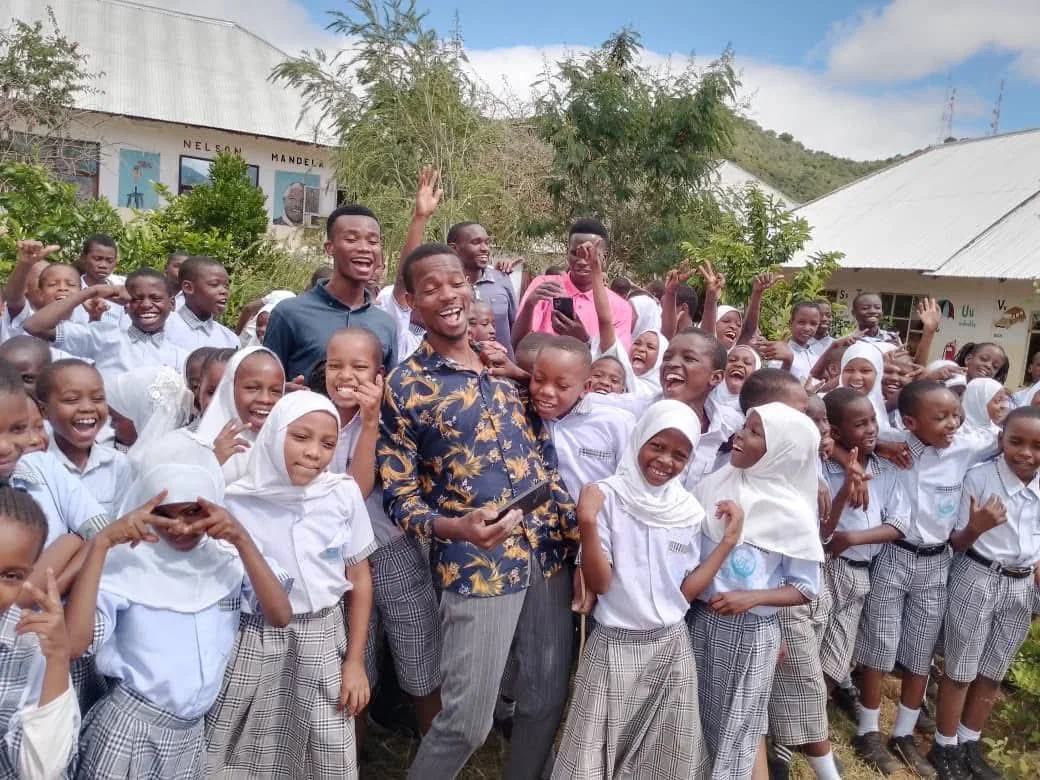 FPSC learners and community members together at school in Mwanga District